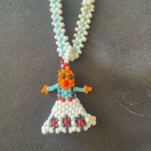 1970-80 Daisy chain necklace with doll pendant turquoise and white